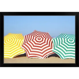 "Colorful umbrellas on beach" Black Framed Print