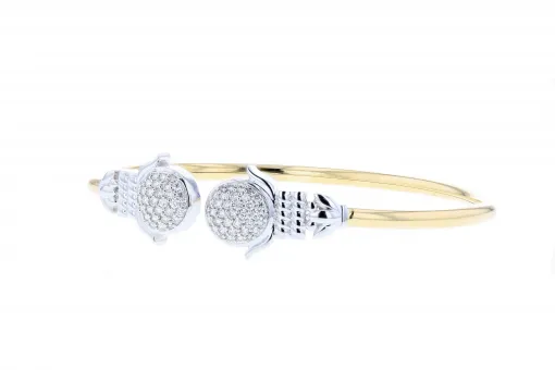 Solid 14K yellow gold flex bangle bracelet with white gold accents and 0.75ct diamonds